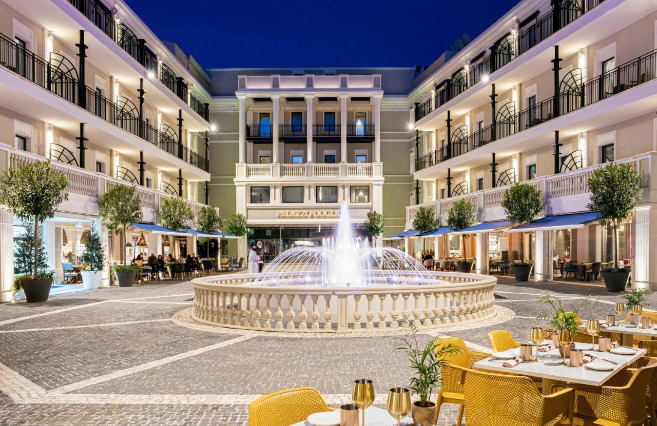 Готель Palazzo Doglio Кальярі Екстер'єр фото The Hotel's courtyard